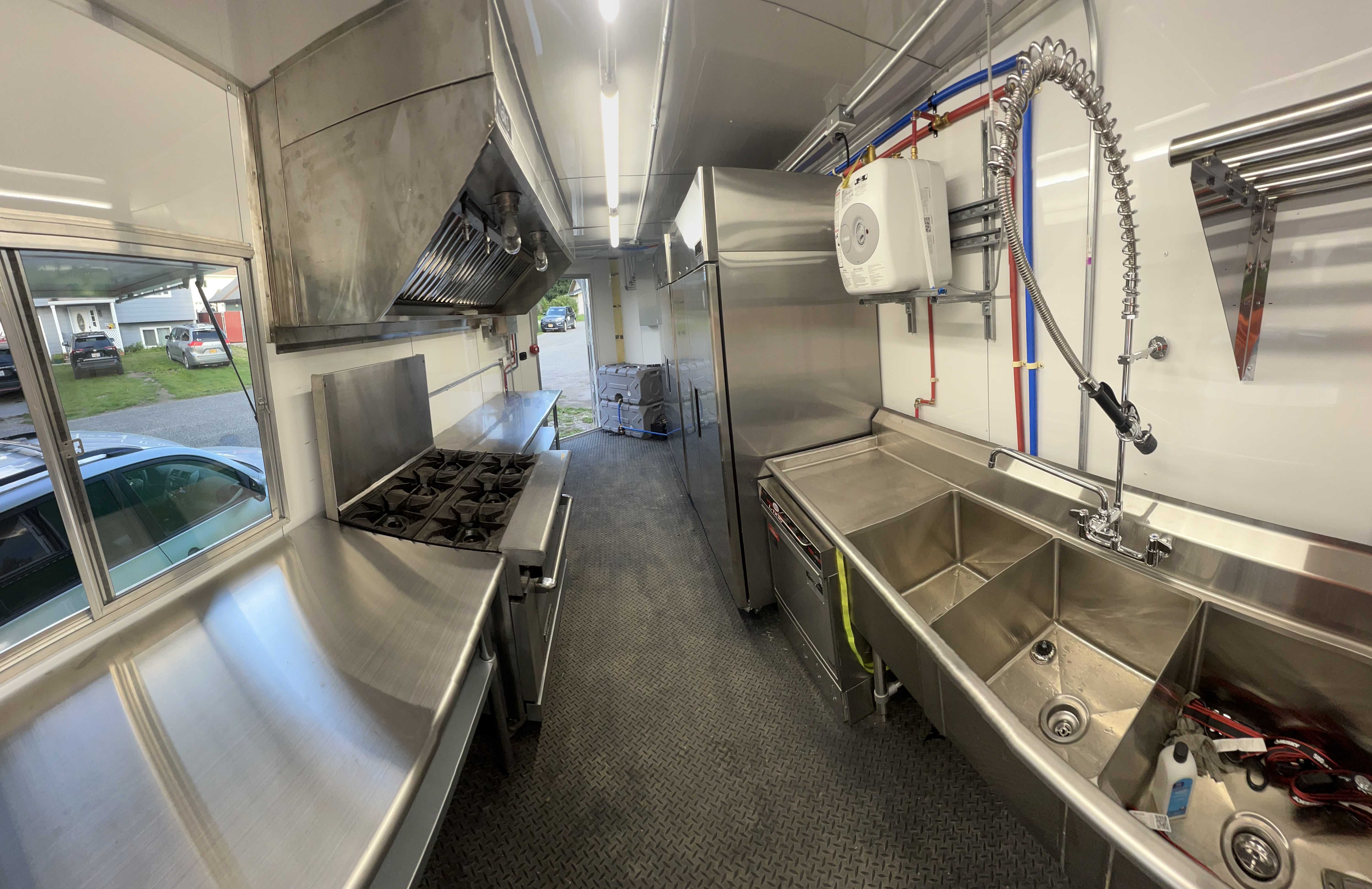 Full interior view of the mobile kitchen, showing all commercial equipment